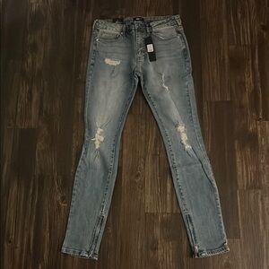 Distressed Blue Jeans with Zipper Details